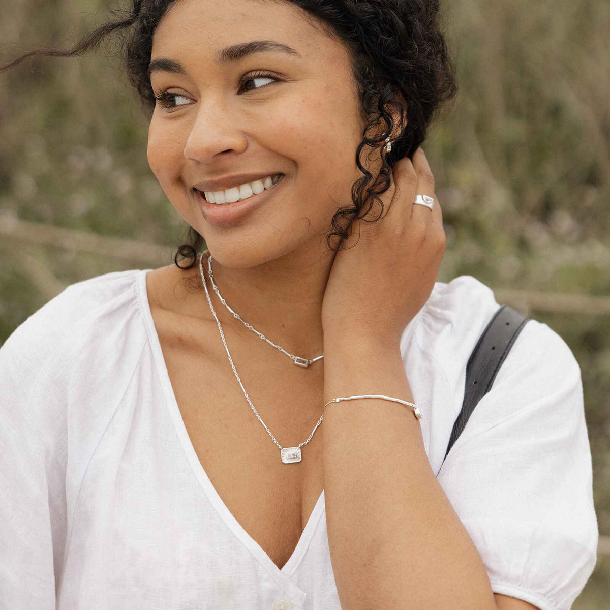 Silver Baguette Sunburst Pendant Necklace