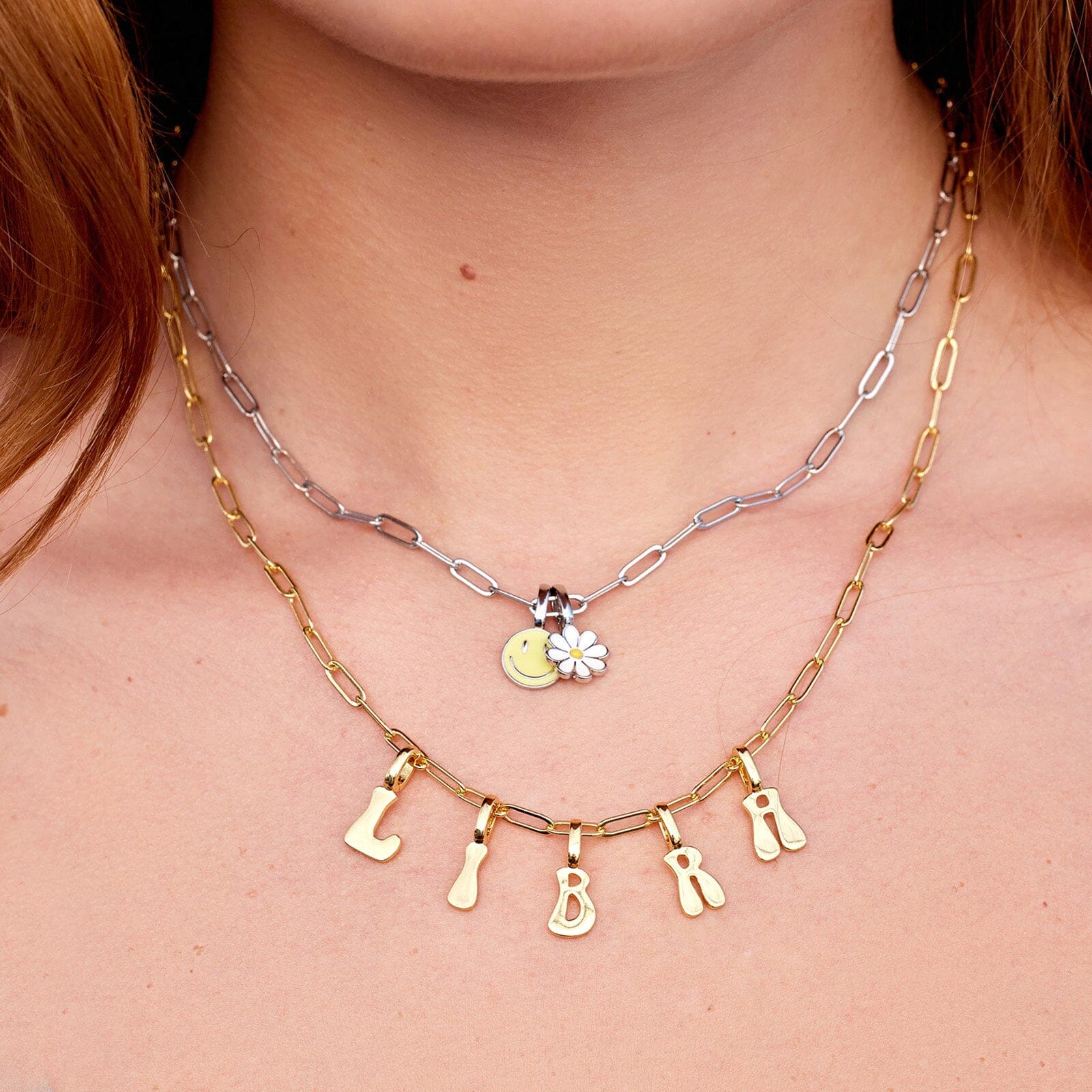 We are in LOVE with this new charm necklace! A yellow gold paper clip chain  with dangling charms! Maria personalized this necklace to have… | Instagram